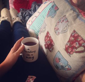 Rachel Cup of Tea on Sofa