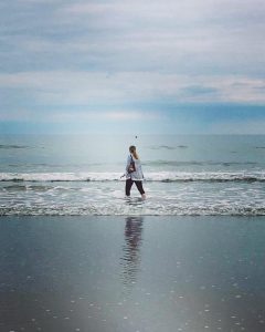Rachel Walking on The Beach