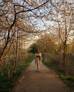 Rachel Standing Under Trees in Spring
