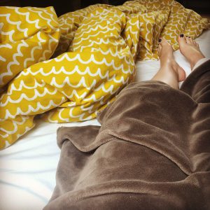 Legs in bed